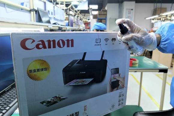 佳能維修產(chan) 品檢修完畢，最後進行包裝消毒出廠